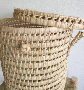 Panier à linge ronde en feuilles de palmier